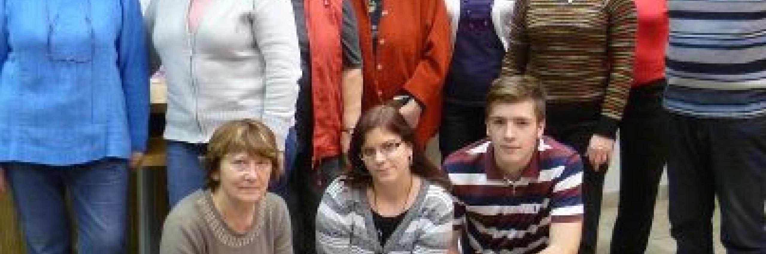 Group of seniors with young volunteers.jpg